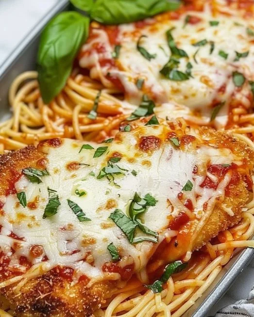 Baked Chicken Parmesan 2 Delicious Baked Chicken Parmesan topped with melted cheese and herbs