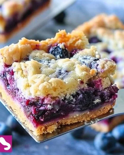 Delicious blueberry cream cheese bars served on a plate