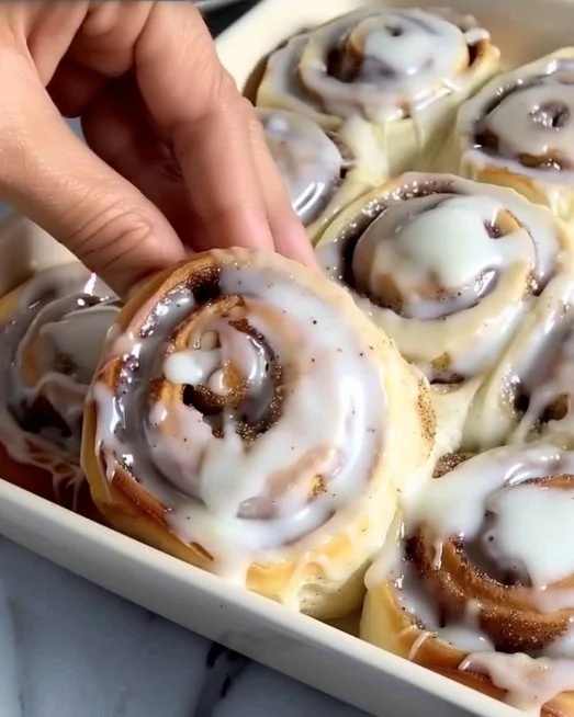 Cinnamon Rolls 2 Freshly baked cinnamon rolls with creamy icing on top