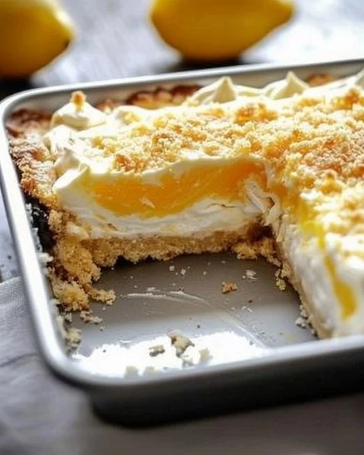 Delicious lemon cream cheese dump cake served on a plate