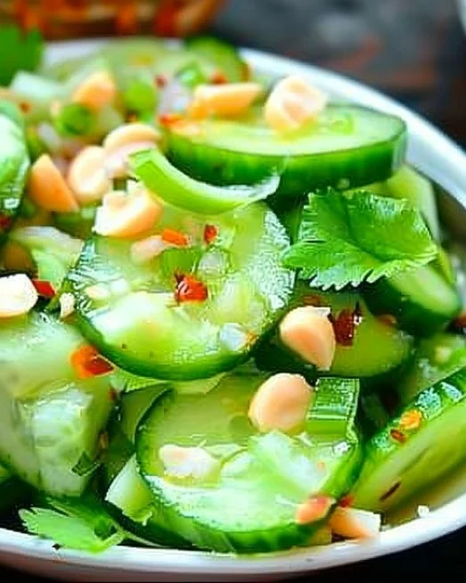 Thai Cucumber Salad 5 Delicious Thai cucumber salad with fresh vegetables and vibrant dressing.
