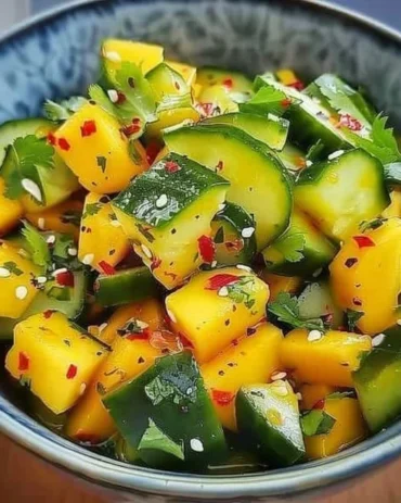 Delicious Thai Mango Cucumber Salad with vibrant colors and fresh ingredients.