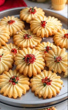 A plate of classic Italian butter cookies, golden and inviting.