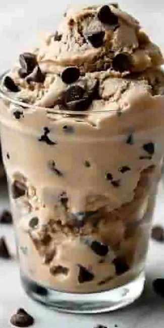 Eggless Edible Cookie Dough Recipe 3 Homemade eggless edible cookie dough in a bowl with chocolate chips.